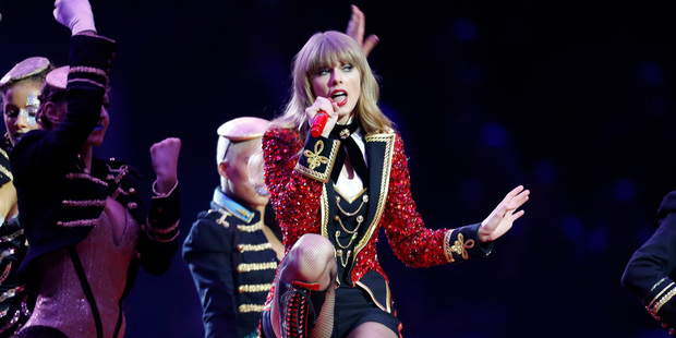 Taylor Swift is getting death threats over her romance with Harry Styles. Photo/AP