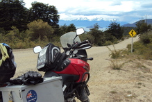 Charlotte Holmes' motorcycle with the backdrop of the Andean mountain ranges. Photo / Charlotte Holmes