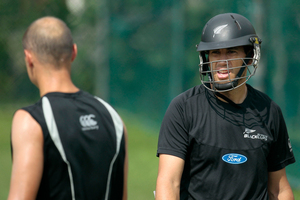 New Zealand's captain Ross Taylor, right, smiles as he looks at Chris Martin during a practice session. Photo / AP
