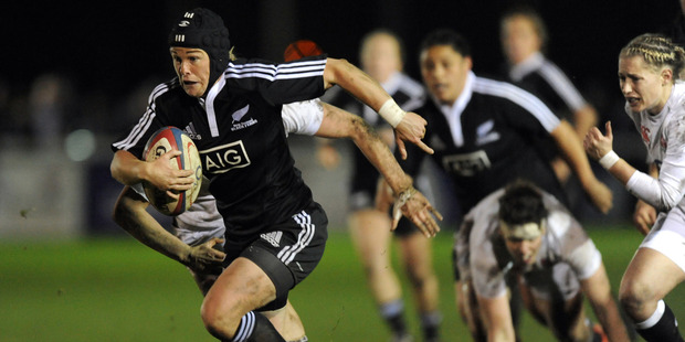 New Zealand's Emma Jensen makes a break during the clash against England in Aldershot yesterday. Photo / Getty Images