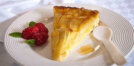 The Warm Apple and Almond Tart is glazed with apricot jam. Photo / Jason Burgess