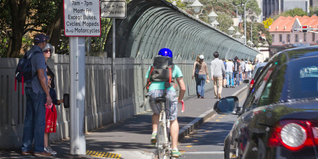 An array of signs cover the Symonds St entrance to Grafton Bridge. Photo / Greg Bowker