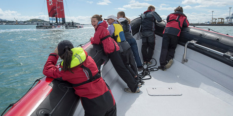 Twelve lucky young sailors went out on the Hauraki Gulf to watch Emirates Team New Zealand train on the AC72 for the America's Cup challenger series. Photo / Chris Cameron