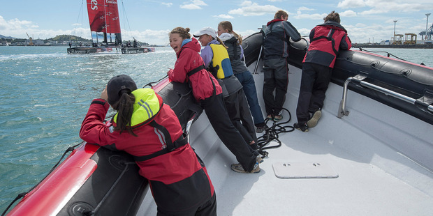 Twelve lucky young sailors went out on the Hauraki Gulf to watch Emirates Team New Zealand train on the AC72 for the America's Cup challenger series. Photo / Chris Cameron