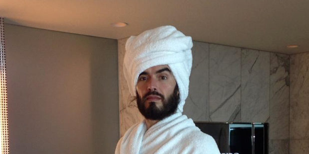 Russell Brand tweeted fans from his hotel bathroom. Photo / Supplied