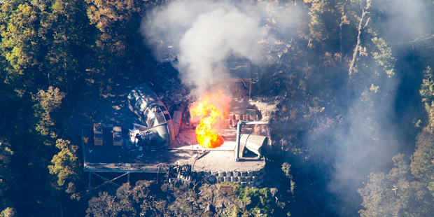 Flames leap from the ventilation shaft at the Pike River Mine. Photo / Mark Mitchell