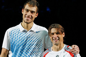 Jerzy Janowicz (left) defied the odds to reach the Paris Open final, where he lost to David Ferrer. Photo / AP
