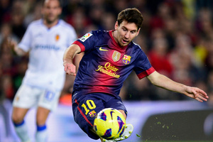 Barcelona's Lionel Messi is looking to become the first player to win the award four times. Photo / AP