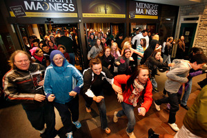 Black Friday shoppers pour into the Valley River Center mall for the Midnight Madness sale in Oregon. Photo / AP