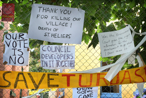 Protest signs outside the Art Deco buildings on Turua Street in St Heliers. Photo / Natalie Slade