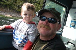 Barry Bethune with grandson Cole Bethune, 2, whose father Shaun died when the Extreme One capsized in Foveaux Strait in January. Photo / Supplied