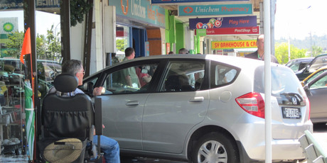 A car wedged in shop window of Etcetera Gifts was an unusual sight for shoppers in Katikati on Tuesday. Photo / Bay of Plenty Times