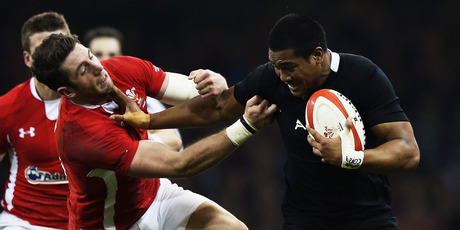 Julian Savea of the All Blacks fends off Alex Cuthbert of Wales during the international match between Wales and New Zealand. Photo / Getty Images.