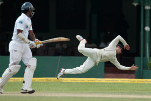 Kayne Williamson pulled off one of the best catches you are likely to see all summer on the fourth day of the Black Caps' second test against Sri Lanka yesterday. Photo / AP