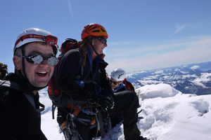 Charlie Taylor, of Australia, Wanaka climbing guide Nick Cradock, and Geoff Millard, of Australia, on the summit of Mt Aspiring. Photo / Guy Cotter