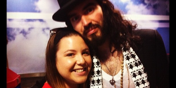 Fan Peta Falzon with comedian Russell Brand, who's in New Zealand for several shows. Photo / Supplied