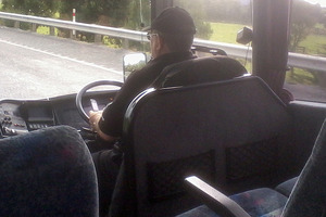 Grant Gordon Banks is snapped by a passenger using a cellphone while driving a bus. Photo / Supplied