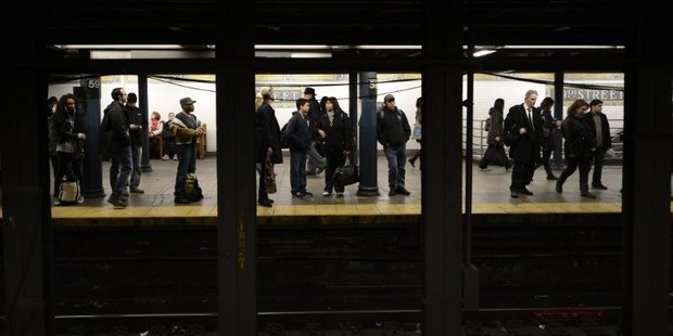 A man was pushed into the path of a subway train in New York yesterday. Photo / AFP