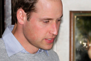 Britain's Prince William leaves the King Edward VII hospital where his wife Kate, the Duchess of Cambridge has been admitted with a severe form of morning sickness. Photo / AP