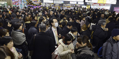 Crowds gather at Sendai railway station in Miyagi Prefecture after trains were halted following a strong earthquake off the coast of northeastern Japan. Photo / AP