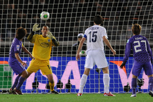 Hisato Sato of Sanfrecce Hiroshima tests Tamati Williams of Auckland City during the FIFA Club World Cup match between Sanfrecce Hiroshima and Auckland City. Photo / Getty Images.