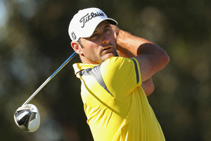 Michael Hendry's wife is coming to the rescue to try and get him to Sydney in time for his tee off at the Australian Open. Photo / Getty Images.