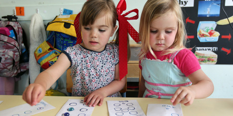 Bella Neville, left, and Grace Cameron of Lakeview Kindergarten count to improve their maths skills. Photo / Doug Sherring