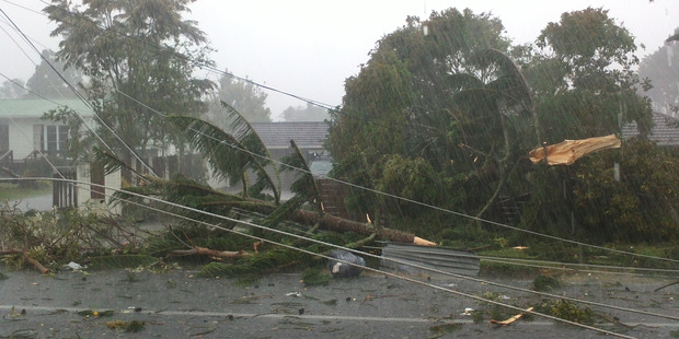 The tornado badly damaged many properties, forcing several hundred Hobsonville residents to seek shelter at the Whenuapai Air Base. Photo / Tammy Cowan