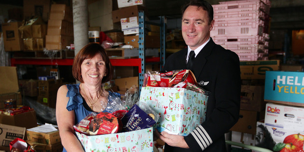 City Mission boss Diane Robertson and Jetstar chief pilot Richard Falkner launch the Christmas appeal. Photo / Doug Sherring