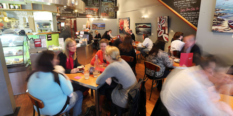 Lunch service at Cafe Neo in Wellington. Spending figures suggest the party season is getting underway. Photo / Getty Images
