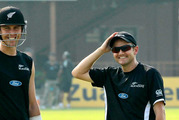 Mike Hesson, right, smiles as he talks to player Trent Boult during a cricket practice session in, Sri Lanka. Photo / AP