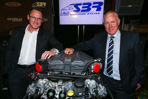 Ross Stone (right) with Erebus Motorsport chief Ryan Maddison and the Mercedes engine the new SBR car will use. Photo / Supplied