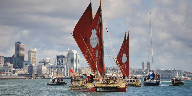The Northland-built, double-hulled waka leave Auckland at the start of their epic journey to Easter Island. Photo / Alan MacGillivray
