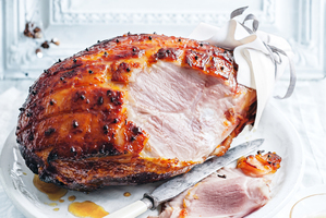 This classic glazed ham teams with the bright pop of dried cranberries for a festive touch. Photo / Benjamin Dearnley