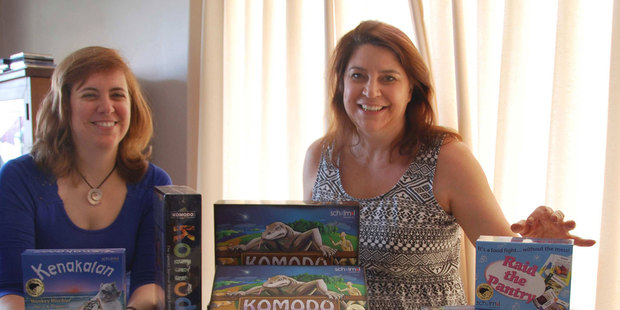 Local games designers Julia Schiller (l) and Amanda Milne with some of their creations. Photo / Supplied