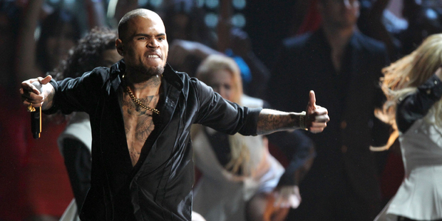 Chris Brown performing at the American Music Awards. Photo/AP