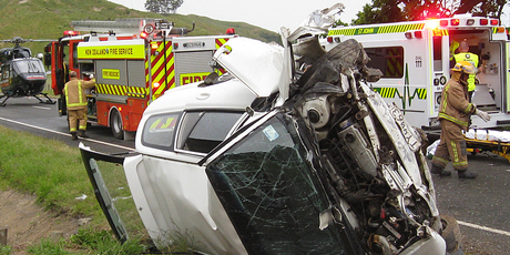 Emergency services attend the scene of a motor vehicle accident in northern Hawkes Bay on Sunday. Photo / Lowe Corporation Rescue Helicopter Service