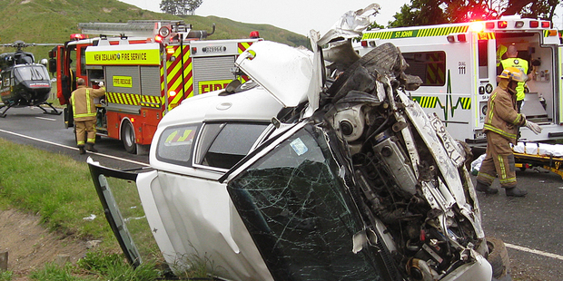 Emergency services attend the scene of a motor vehicle accident in northern Hawkes Bay on Sunday. Photo / Lowe Corporation Rescue Helicopter Service