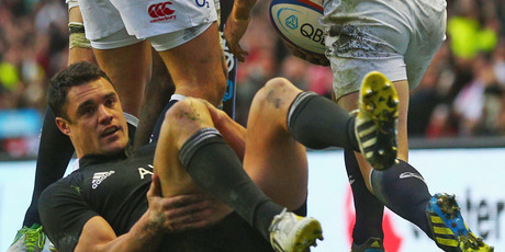 Dan Carter lies down on the ground following an England try at Twickenham. Photo / Getty Images
