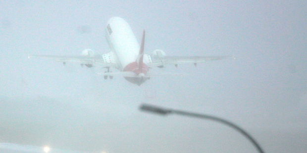 A Qantas flight takes off out of Wellington Airport. Photo / Tim Hales