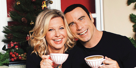 Olivia Newton-John and John Travolta in the cover image for This Christmas.