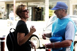 Are friendly charity collectors like Rotary volunteer Ken Linkhorn (r) being pushed aside by hustling chuggers? Photo / Janna Dixon