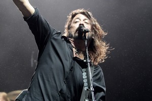 Dave Grohl performs at Western Springs during the band's December show. Photo / Richard Robinson