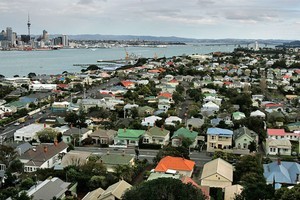 The housing market is tight, says Realestate.co.nz, with the number of homes for sale in the three major cities falling to its lowest level in four years. Photo / Herald on Sunday