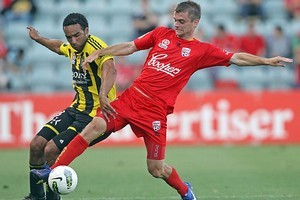 Paul Ifill (L) of Wellington competes with Cameron Watson (R) of Adelaide. Photo / Getty Images