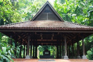 The supposed tomb of the last sultan of Singapore sits sheltered under a traditional 14th century Malay roof on top of Fort Canning Hill. Photo / Jim Eagles