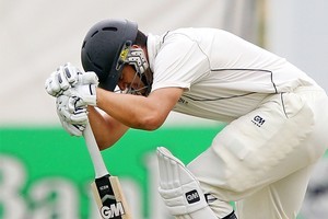 Ross Taylor reacts after an injury. Photo / Getty Images