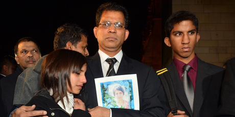 Jacintha Saldanha's husband Benedict Barboza arrives at the Houses of Parliament with daughter Lisha, 14, and son Junal, 16, for a meeting with a British Member of Parliament. Photo / AP