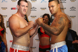 Paul Gallen (L) and Hika Elliot face off during the Fight for Life Weigh In. Photo / Getty Images.