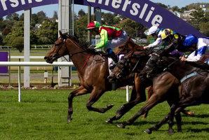 Mosse bursts through the pack to score a brilliant win in the Concorde at Ellerslie on Saturday. Photo / Steven McNicholl